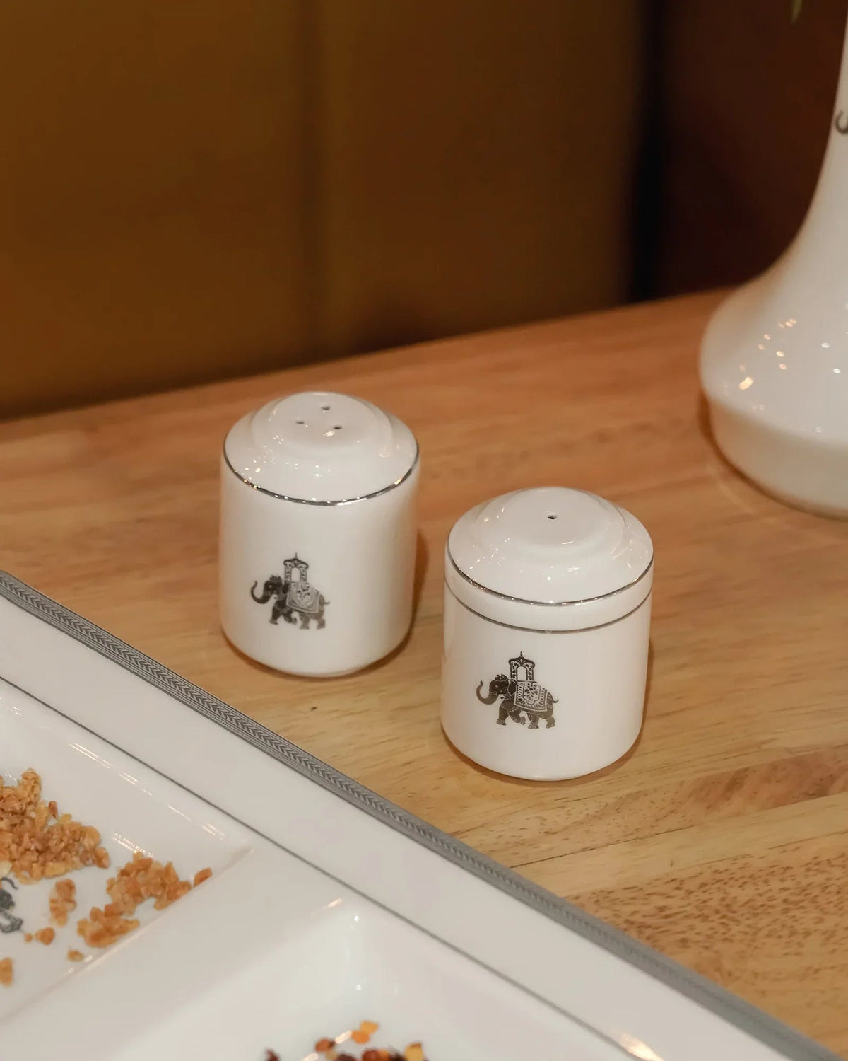 Vola Gaj Porcelain Salt & Pepper Shakers | Platinum Detail